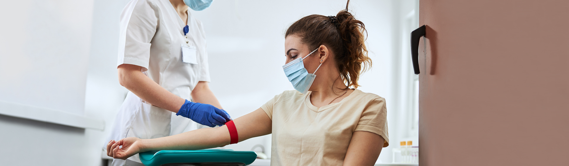 Woman getting blood withdrawn